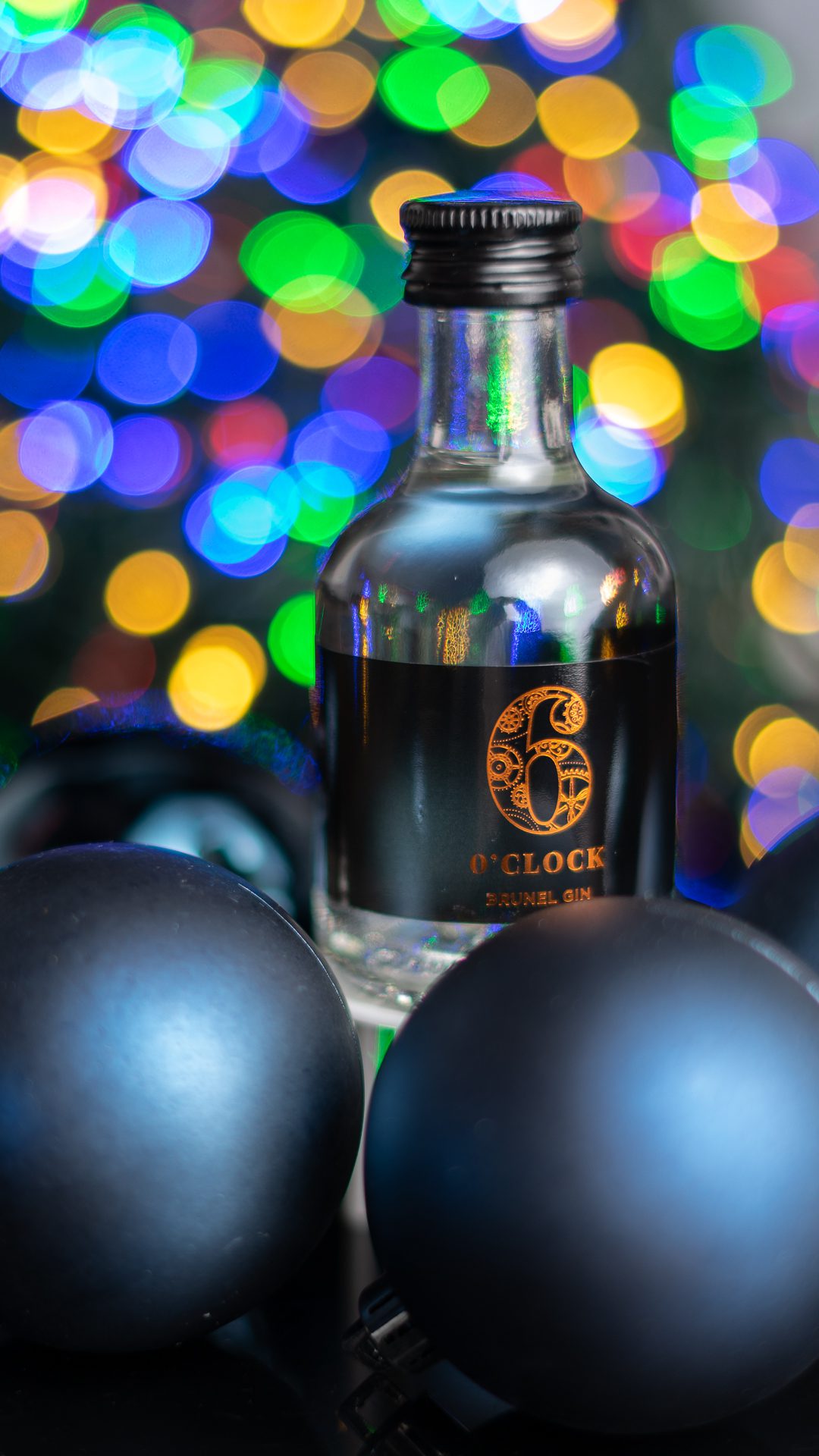 Gin Bottle With Multicolour Bokeh Background