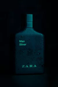 Men's Perfume On Black Background
