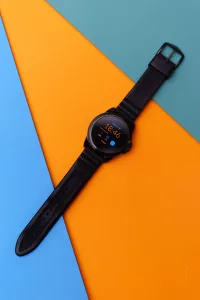 Men's Watch Flatlay With Orange And Teal Background - Product Photography